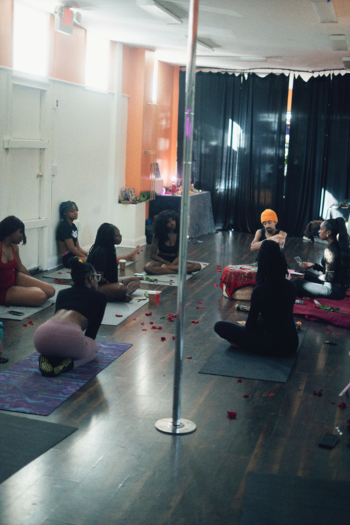 Group seated in circle for the Kemetic Sound Experience